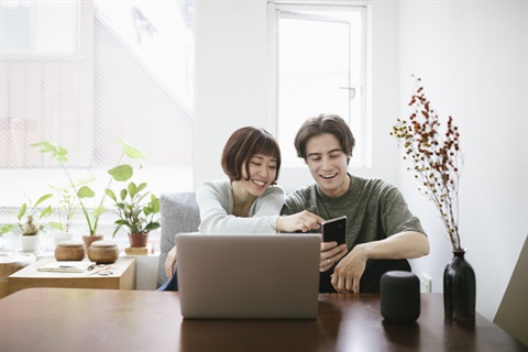couple working together on a computer